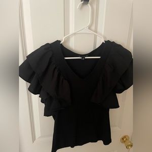 Black shirt with frilly sleeves